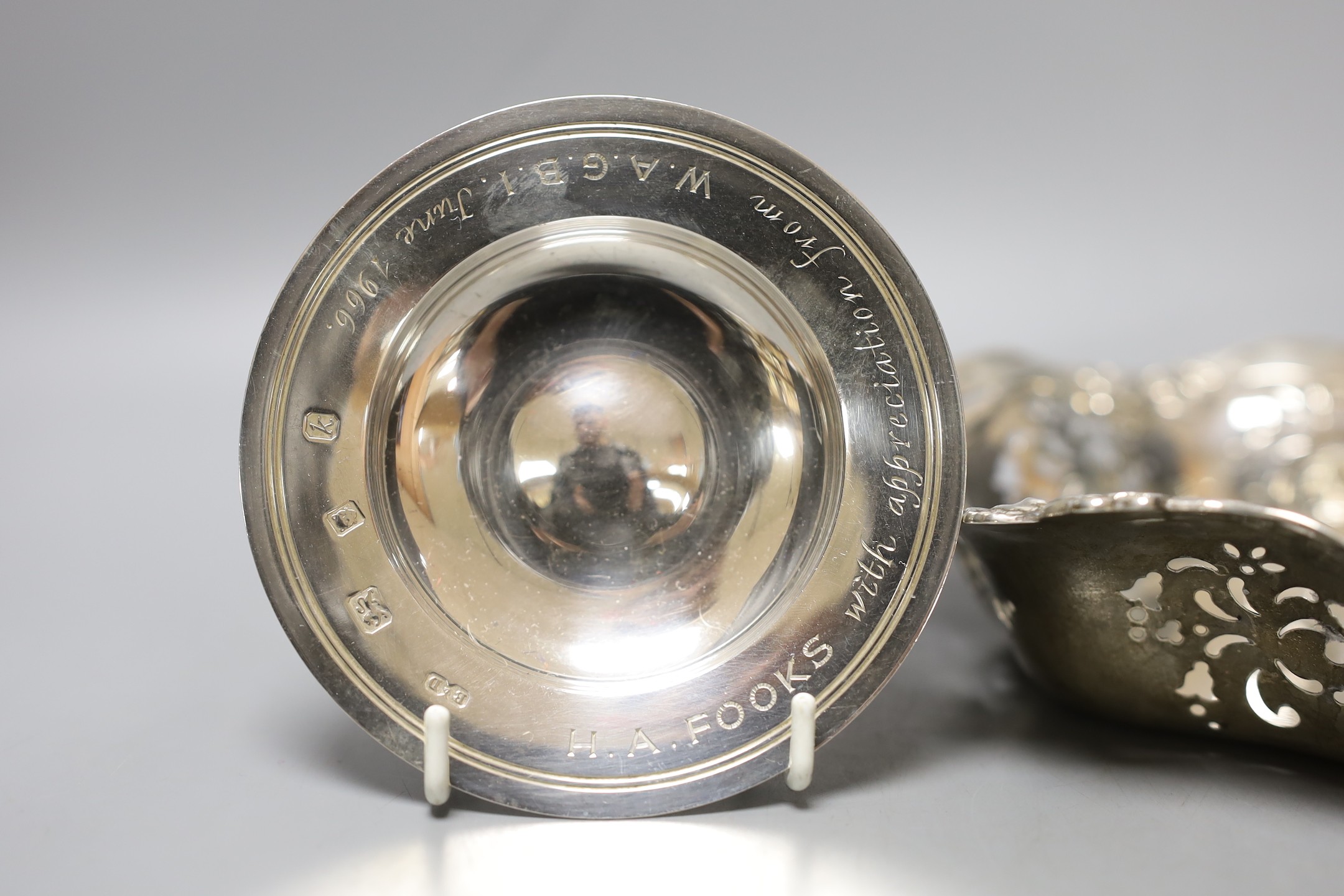 An American pierced sterling bowl, by Caldwell & Co, 28.5cm, a 1960's small silver armada dish and an Egyptian white metal canister and cover